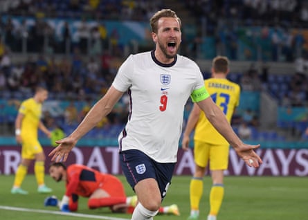 England’s Harry Kane celebrates scoring their first goal