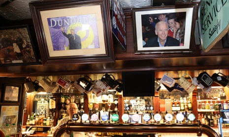A picture of Joe Biden hangs above the bar next to a picture of Bill Clinton