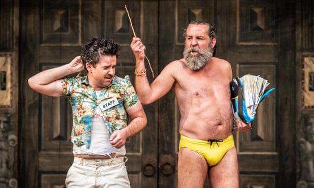 Ciaran O'Brien as Caliban and Ferdy Roberts as Propsero in The Tempest at Shakespeare's Globe.