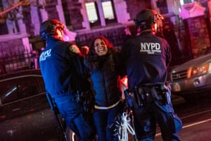 Police arrest a protester during pro-Palestinian demonstrations at the City College Of New York, US.