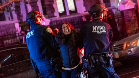 A protester is arrested at the City College Of New York on 30 April.