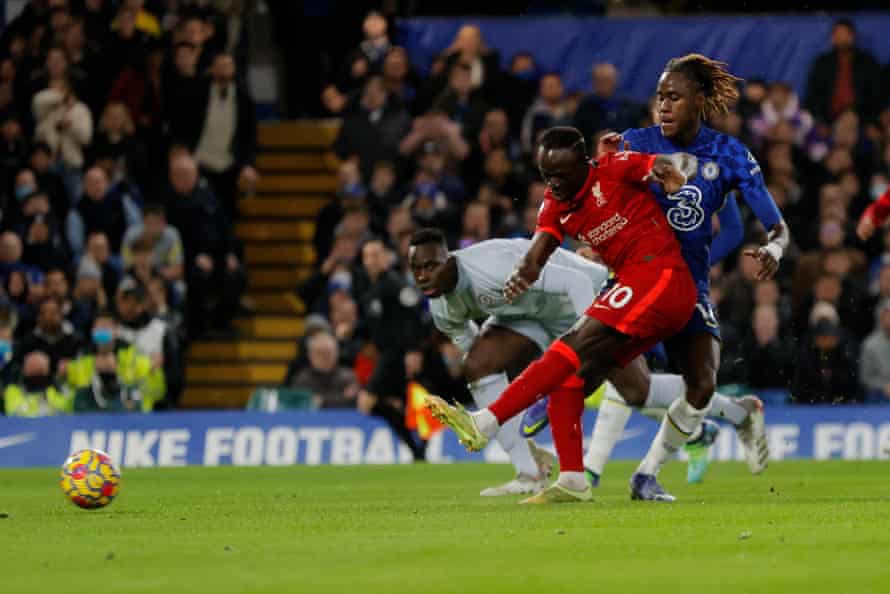 Liverpool’s Sadio Mane scores their first goal.