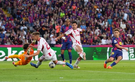 Fermín López scores during the Champions League match between Barcelona and Olympiacos
