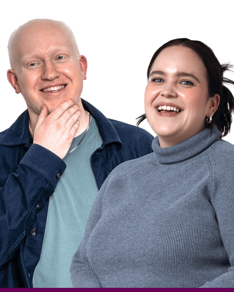 Man with hand on his chin smiling. Woman with black hair smiling at camera