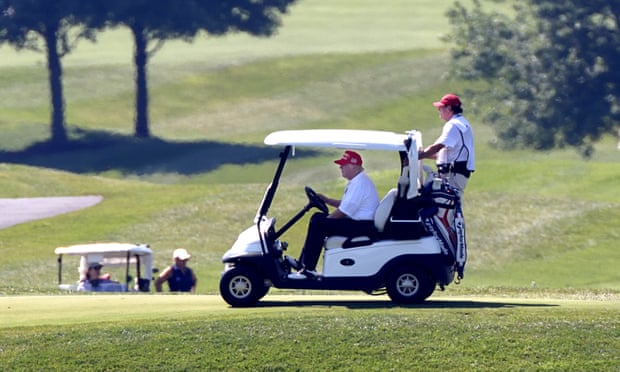 Trump plays golf in Sterling, Virginia, in July.