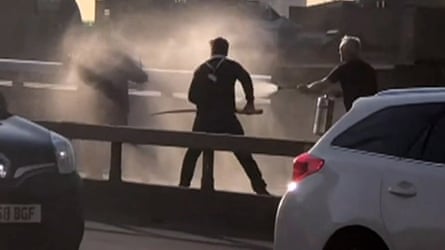 Steve Gallant (with the narwhal tusk) and another ex-offender, John Crilly, fight the terrorist attacker, Usman Khan, on the bridge, 29 November 2019.