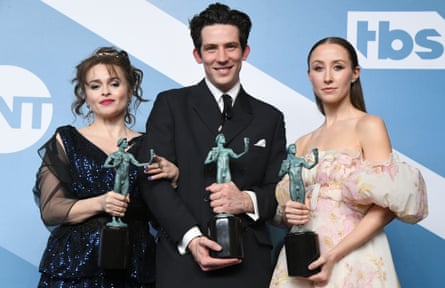 Helena Bonham Carter, Josh O’Connor and Erin Doherty pose with the trophy for Outstanding Performance by an Ensemble in a Drama Series for “The Crown” in the press room during the 26th Annual Screen Actors Guild Awards at The Shrine Auditorium on January 19, 2020 in Los Angeles, California