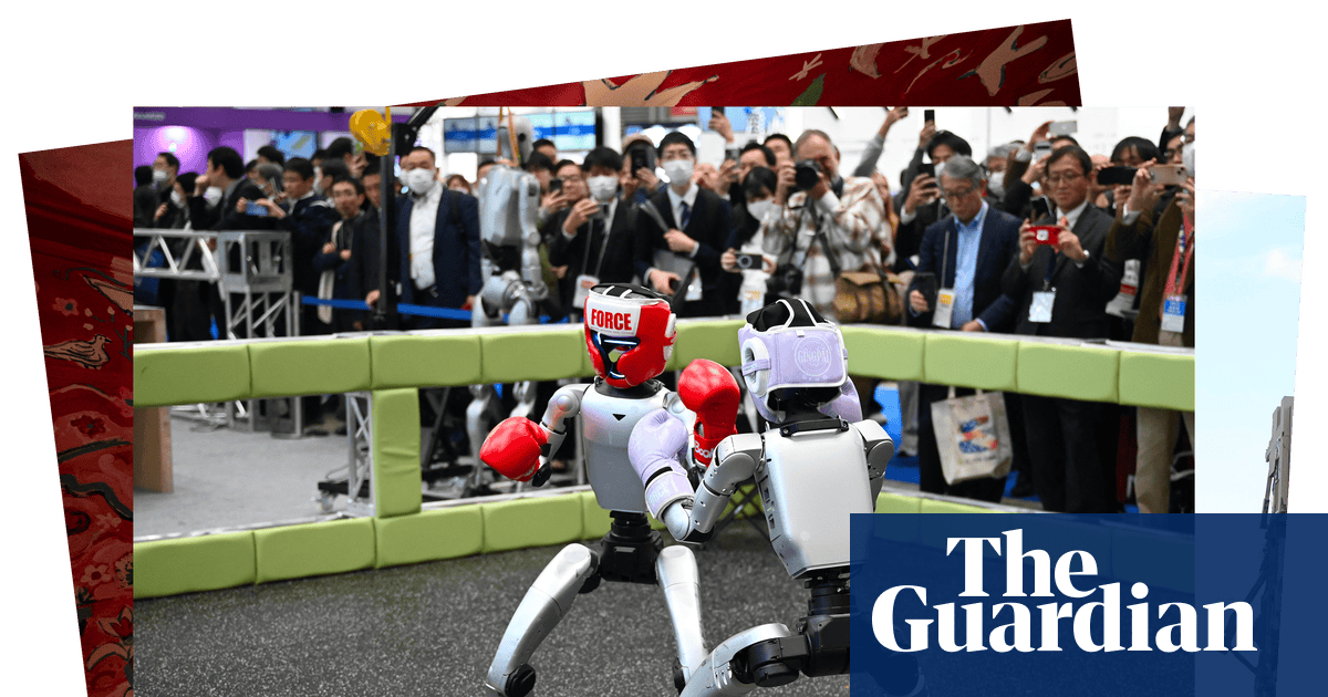 Boxing robots, a mass wedding and a home as art: photos of the day – Wednesday