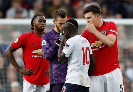 Manchester United’s Harry Maguire and David de Gea remonstrate with Liverpool’s Sadio Mane.