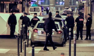 French police at the site of the knife attack near Opera Garnier in Paris.
