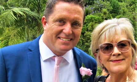 Jill Killington and Ian Pritchard in blue suit with pink flower