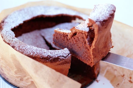 A serving of a sunken chocolate cake
