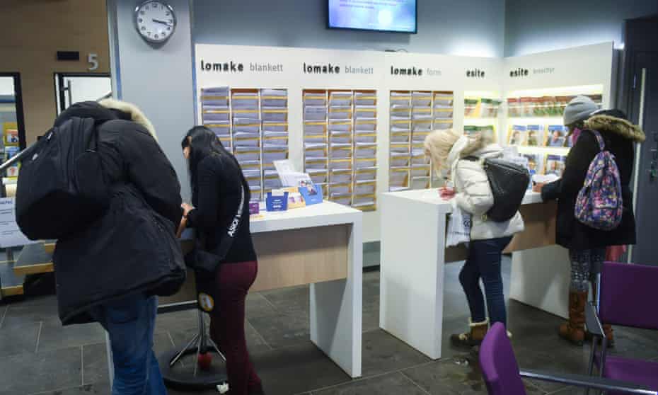 Clients in a social insurance institution office in Helsinki, Finland