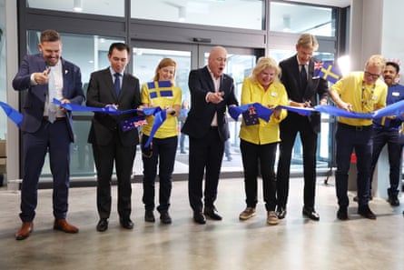 New Zealand prime minister Christopher Luxon cuts the ribbon as Ikea opens its doors.