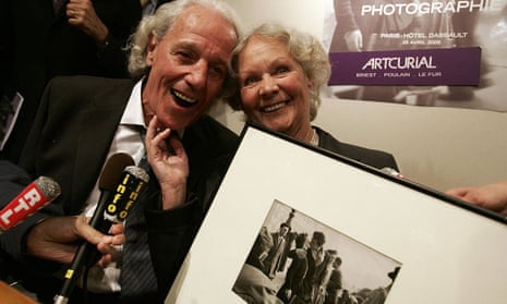 Françoise Bornet and her husband with a framed copy of the photo