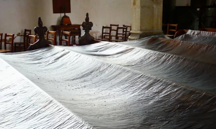 Pews at All Saints Church, Thornham covered in polythene to catch bat droppings