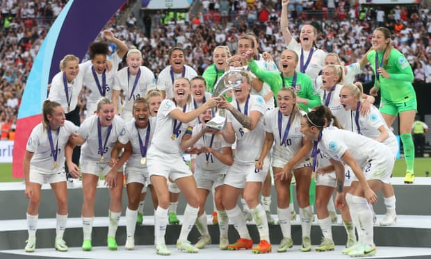 England lift the trophy after their victory over Germany.