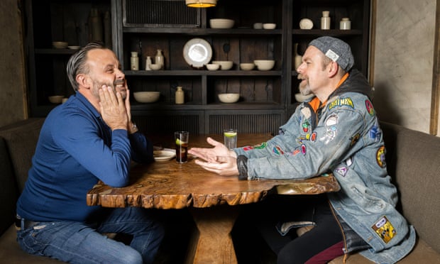 Comedians Geoff Norcott and Rufus Hound chatting at a table at Hide restaurant in London