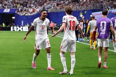 Anthony Gordon celebrates with Morgan Rogers after scoring England’s goal against Argentina