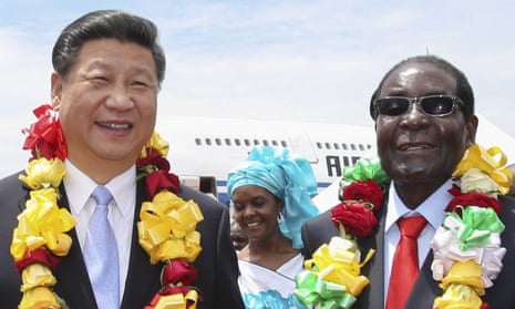 Robert Mugabe, right, with the Chinese president, Xi Jinping, in Harare