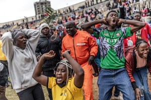 Supporters of Kenya’s opposition leader, Raila Odinga, express their grief at his death