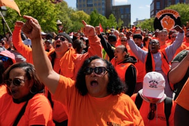 people chant while walking outside