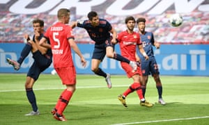 Robert Lewandowski rises high to head in Bayern Munich’s fourth goal against Bayer Leverkusen