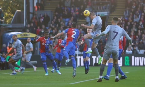 Vitaliy Mykolenko scores a header