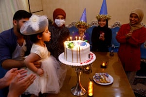 A family celebrates their daughter’s birthday, Najaf, Iraq
