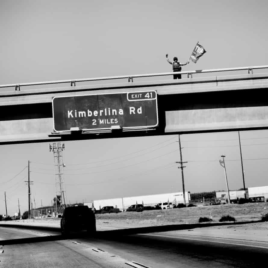 USA. Bakersfield, California. 2020. Trump supporter on an overpass.