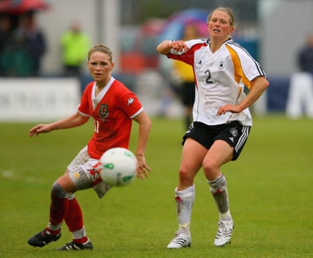 Kerstin Stegemann of Germany (right) is beaten to the ball by Jess Fishlock of Wales during their Women’s Championship qualifier at New Bridge Meadow on May 10, 2007.