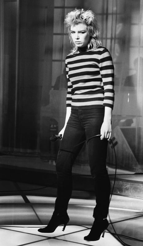 Kim Wilde wearing a stripy top and dark trousers