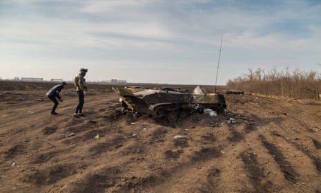 Ukrainians inspect a Russian tank near Mykolaiv which was one of six reportedly destroyed in a clash two weeks ago.