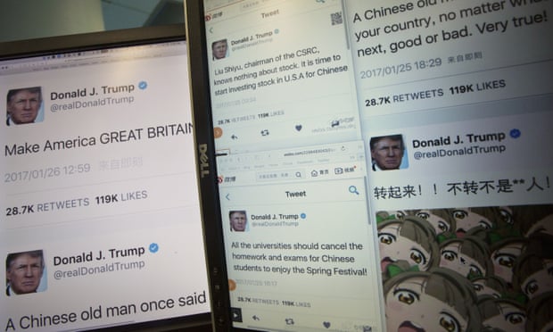 Computer screens display fake tweets that users can generate at a Chinese website.
