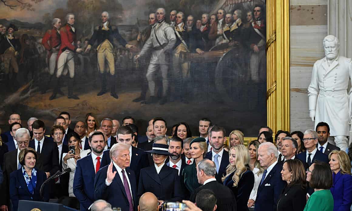 Donald Trump takes the oath of office.