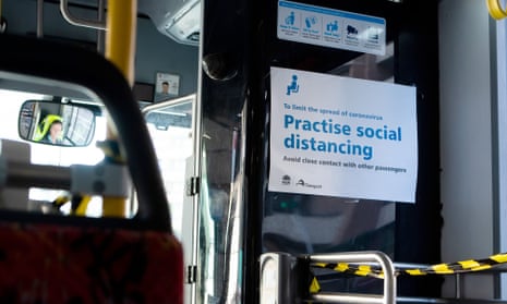 Sydney bus with social distancing sign 