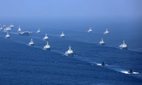 The Liaoning aircraft carrier is accompanied by navy frigates and submarines conducting an exercises around Taiwan at the northern edge of the South China Sea in 2018.