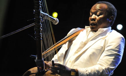 Mory Kanté plays the kora, the ancient west African harp, while performing at the Sziget festival in Budapest, 2008.