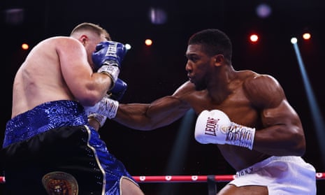 Anthony Joshua lands a right hand on Otto Wallin during Saturday’s main event.