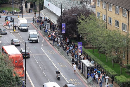 Fans walk to the Oval from the tube station before the fifth day’s play in the final England and India Test