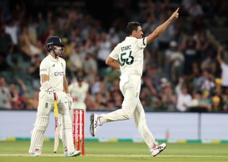 Mitchell Starc takes the wicket of Rory Burns with a pink ball at Adelaide Oval during the 2021 Ashes series.