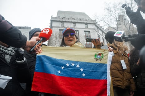 A Venezuelan immigrant celebrates Maduro’s detention outside of the Daniel Patrick Moynihan United States Courthouse, where Venezuelan President Nicolas Maduro is scheduled to be arraigned on drug charges in New York, New York, USA, 05 January 2026.