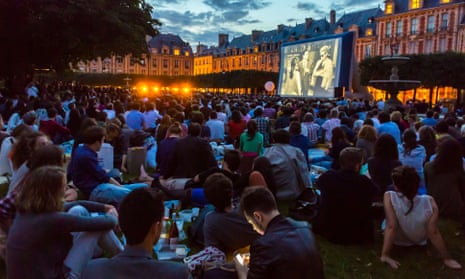 Open-air cinema in Place des Vosges, Paris.
