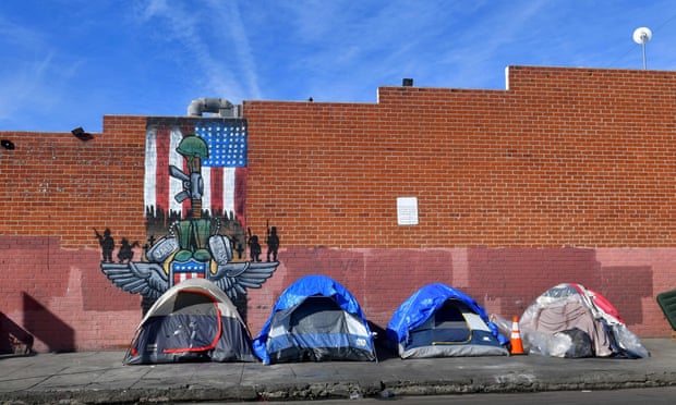 Tents for homeless people line a sidewalk in Los Angeles, California. Trump has used the crisis to attack opponents.