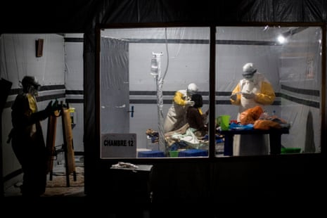 Health workers treat an unconfirmed Ebola patient, inside an MSF-supported Ebola treatment centre in Butembo, Democratic Republic of the Congo