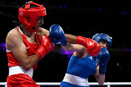 Algeria's Imane Khelif lands a punch on Italy's Angela Carini.