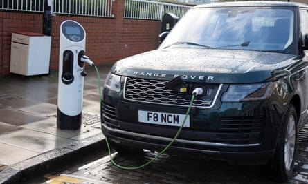 Range Rover SUV car at an electric charging point