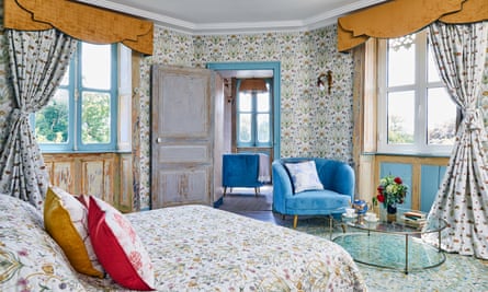 Blooms with a view: the Potagerie suite with bedding and wallpaper from Angel’s homewares collection.