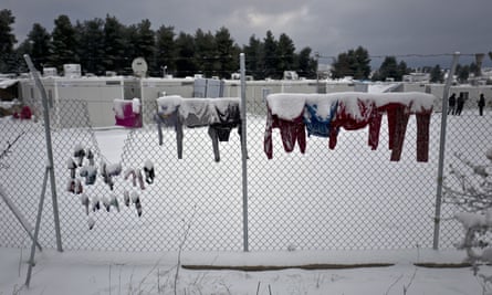 Laundry of Syrian refugees covered with snow at the refugee camp of Ritsona, north of Athens.