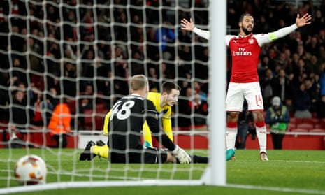 Arsenal’s Theo Walcott celebrates scoring their second goal.